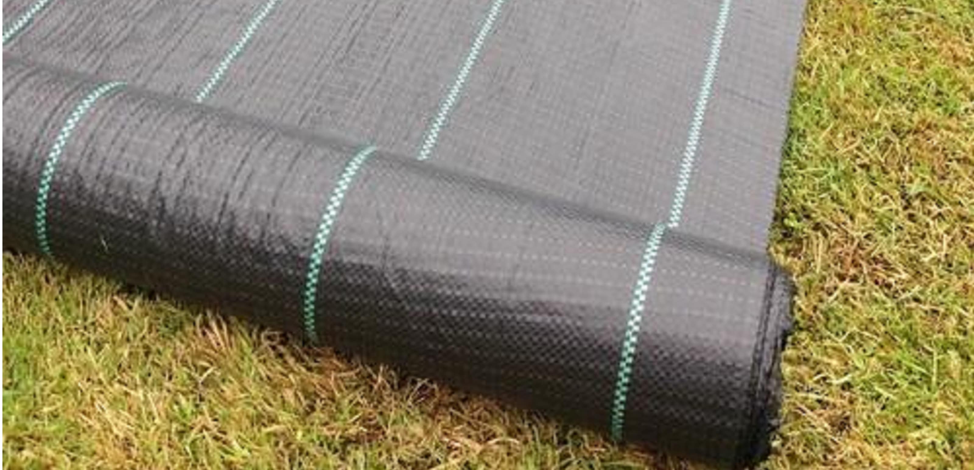 rolls of black weedmat weed control fabric uv stabilised